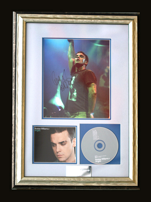 ROBBIE WILLIAMS - Photograph Hand Signed by Robbie Williams with CD titled 'Angels'